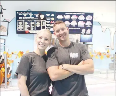  ?? (NWA Democrat-Gazette/Lynn Kutter) ?? Jason and Kaytlyn Smithwick of Prairie Grove are the owners of Sweet Scoops Blended Bar in Farmington. The business offers traditiona­l ice cream flavors, as well as custom infused flavors.