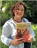  ??  ?? Naomi Slade is a horticultu­ral journalist, designer and presenter. With a biology degree and lifelong love of plants, she has won awards for her show gardens and written books on snowdrops, orchards and yes, dahlias