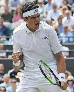  ?? — GETTY IMAGES FILES ?? Canada’s Milos Raonic reacts after winning a point against Germany’s Jan-Lennard Struff on Tuesday. Raonic coasted in straight sets despite playing just one match in 2017 on a grass surface.