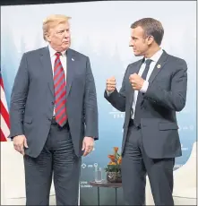  ?? EVAN VUCCI — THE ASSOCIATED PRESS ?? President Donald Trump and French President Emmanuel Macron, who have had their difference­s of late, were scheduled to meet Friday night.