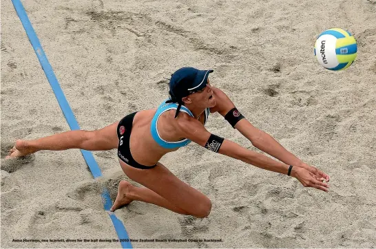  ?? GETTY IMAGES ?? Anna Harrison, nee Scarlett, dives for the ball during the 2010 New Zealand Beach Volleyball Open in Auckland.
