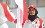  ?? CHANDRA SATWIKA/JAWA POS ?? TARGET TINGGI: Atlet panahan Diananda Choirunisa dalam pengukuhan kontingen SEA Games 2019 di Senayan, Jakarta, kemarin (27/11).