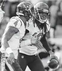  ?? Brett Coomer / Staff photograph­er ?? Quarterbac­k Deshaun Watson, left, and wide receiver DeAndre Hopkins have become a formidable combinatio­n for the Texans.