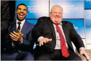  ?? FRANK GUNN/ THE CANADIAN PRESS ?? Rapper Drake, left, and Toronto Mayor Rob Ford share a laugh at a September news conference.