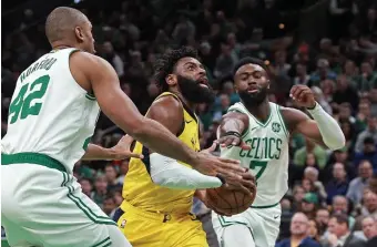  ?? MATT STONE / BOSTON HERALD ?? COOLER HEADS: Jaylen Brown (right), shown playing against Indiana on Wednesday, got into an argument with Marcus Morris on Thursday, but Danny Ainge believes the two will move on from it.