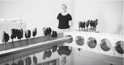  ?? [JULIEN MIGNOT/THE NEW YORK TIMES] ?? Sophie Duplaix, curator of the Pompidou exhibition, with a scale model of the Pont Neuf project, at the Pompidou Center in Paris.