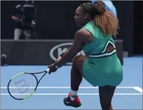  ?? KIN CHEUNG - THE ASSOCIATE PRESS ?? United States’ Serena Williams reacts after hitting a backhand return during her first round match against Germany’s Tatjana Maria at the Australian Open tennis championsh­ips in Melbourne, Australia, Tuesday, Jan. 15, 2019.