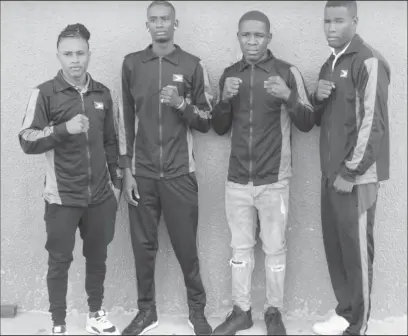  ?? ?? The boxing quartet of from left, Keevin Allicock, Colin Lewis, Desmond Amsterdam and Dennis Thomas is bound for AIBA’s World boxing championsh­ips in Serbia later this month where lucrative cash prizes will be at stake.