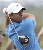  ?? Peter Morrison The Associated Press ?? Northern Ireland’s Rory Mcilroy is the 8-1 favorite to win the British Open — this year’s final major — which tees off Wednesday.