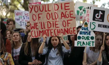 ??  ?? ‘Young people are not convinced older generation­s are doing enough to leave them with an inhabitabl­e planet or viable livelihood­s.’ The global climate strike in London, 2019. Photograph: Dan Kitwood/Getty Images