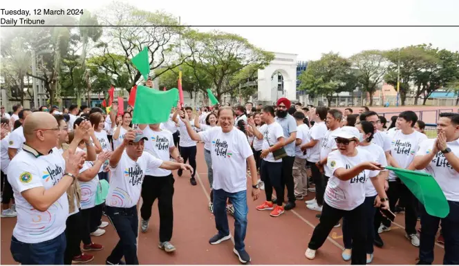  ?? PHOTOGRAPH BY ANALY LABOR FOR THE DAILY TRIBUNE @tribunephl_ana ?? THE Department of Health-Metro Manila Center for Health and Developmen­t, together with Marikina City Mayor Marcy Teodoro, led various cardio exercises and desk mobility exercises during the celebratio­n of Philippine Heart Month with the theme ‘Ka-Heartner, Choose Heart’ Health Fair at the Marikina Sports Center in Marikina City.