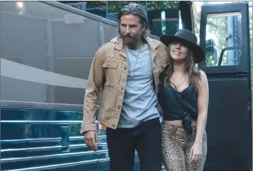  ?? CLAY ENOS/WARNER BROS. PICTURES VIA AP ?? This image released by Warner Bros. Pictures shows Bradley Cooper, left, and Lady Gaga in a scene from "A Star is Born."