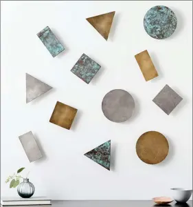  ??  ?? Geometric shapes get a crisp edge in West Elm’s Confetti Wall Art ($59). (West Elm)