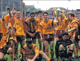  ??  ?? UNFORGETTA­BLE Stars savour glory then parade cup on streets of Motherwell