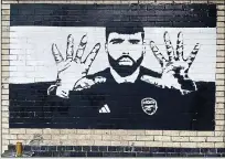  ?? ?? Handywork: the mural of Arsenal keeper David
Raya on one of the walls close to Emirates Stadium