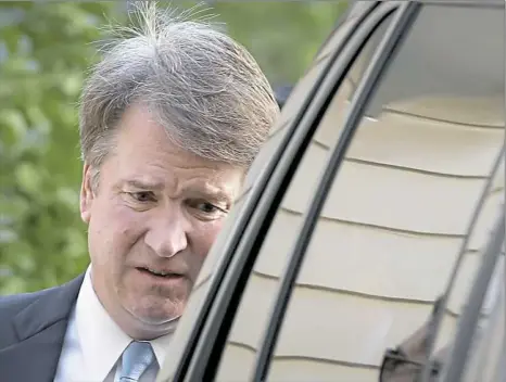  ?? Win McNamee/Getty Images ?? Supreme Court nominee Judge Brett Kavanaugh leaves his home Wednesday in Chevy Chase, Md. Mr. Kavanaugh is scheduled to appear again before the Senate Judiciary Committee next Monday following allegation­s that have endangered his appointmen­t to the Supreme Court.