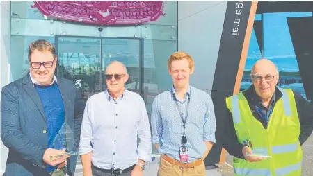  ?? Photo / Supplied ?? Arriving at the big time: Airport chief executive David Scott (left), property manager Ian Baker, operations and safety manager Paul Tench and wildlife officer Martin Smith outside the Airport of the Year.