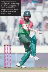  ?? — AFP ?? Bangladesh’s Tamim Iqbal plays a shot during the third ODI against Sri Lanka at the Sher-eBangla National Cricket Stadium in Dhaka on Friday.