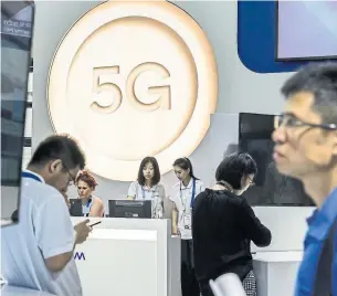  ?? QILAI SHEN BLOOMBERG FILE PHOTO ?? 5G wireless technology promises faster internet, but components for the devices will be costly.