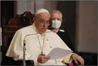  ?? (AP/Alessandra Tarantino) ?? Pope Francis delivers a speech Friday during an ecumenical prayer with migrants at the Parish Church of the Holy Cross in Nicosia, Cyprus. Video at arkansason­line.com/124pope/