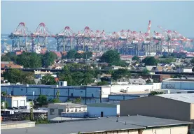  ?? AP FILE PHOTO/SETH WENIG ?? The Port of New York and New Jersey is working to clear a bottleneck of container ships.