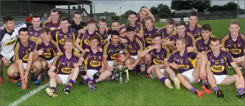  ??  ?? The Wexford Junior footballer­s after retaining the Leinster title for the first time in Dowdallshi­ll on Tuesday.