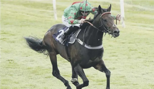  ??  ?? 0 Ocean Win ridden by Jack Mitchell, got within a length of the great stayer Stradivari­us in the Sagaro Stakes