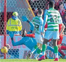  ??  ?? One up: Callum McGregor strikes for the Hoops