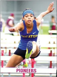  ?? Photo by Randy Moll ?? Decatur’s Desi Meek clears a hurdle during the 100meter hurdles at the Pioneer Relays in Gentry. She finished second with a time of 17.07 seconds.