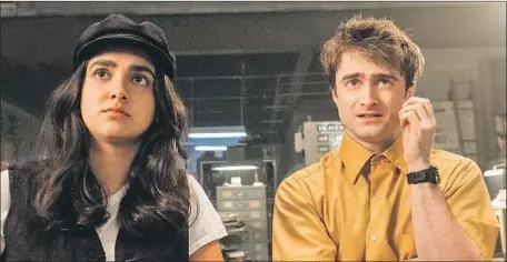  ?? Curtis Baker TBS ?? ELIZA (Geraldine Viswanatha­n) and Craig (Daniel Radcliffe) are angels who join forces to try to save the Earth from a cranky God.