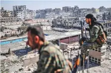  ?? AFP ?? Fighters of the Syrian Democratic Forces expect a slog of two to three months in Hajin.