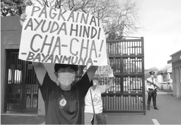  ?? Released / Makabayan bloc ?? Protesters outside Batasang Pambansa in Quezon City rail against fresh moves to amend the Constituti­on in the House of Representa­tives on January 26, 2020.