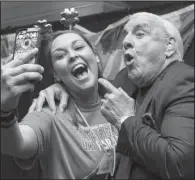  ??  ?? Stephanie Turner of Hot Springs takes a selfie with Ric Flair.