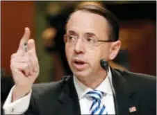  ?? ALEX BRANDON — THE ASSOCIATED PRESS ?? Deputy Attorney General Rod Rosenstein testifies on Capitol Hill in Washington, Tuesday before a Senate Appropriat­ions subcommitt­ee hearing on the Justice Department’s fiscal 2018 budget. Rosenstein said he has seen no evidence of good cause to fire...