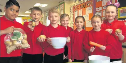  ??  ?? Year 5 and 6 pupils at Brackla Primary School, Bridgend, have made cawl to feed the homeless