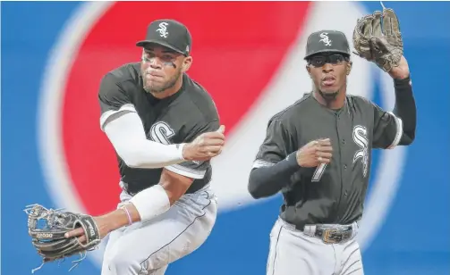  ?? RON SCHWANE/ GETTY IMAGES ?? The Sox already have bright young players, such as Yoan Moncada ( left) and Tim Anderson, who are making an impact in the majors.