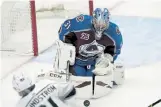  ?? David Zalubowski, The Associated Press ?? Kings left wing Carl Grundstrom, fires the puck at Avalanche goaltender Philipp Grubauer on Sunday.