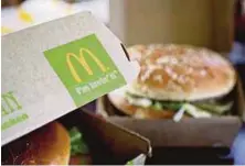  ??  ?? McDonald's decision to offer table service at all US outlets will upend decades of fast-food tradition ina bid to placate pickier customers. Bloomberg pic