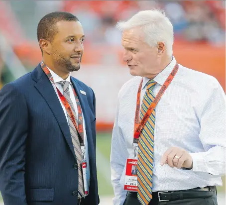  ?? RON SCHWANE/THE ASSOCIATED PRESS ?? Sashi Brown, left, was relieved of his duties as vice president of football operations by owner Jimmy Haslam .