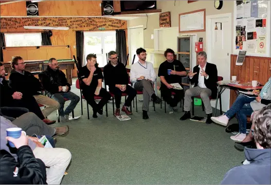  ??  ?? Minister of Agricultur­e Damian O’Connor talking about the complexiti­es of M. bovis at a Makur¯ı meeting of neighbouri­ng farmers to Rangedale, the Landcorp M. bovis-infected farm east of Pahiatua.