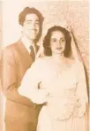  ?? ?? A wedding photo of Frances Alvarez’s parents, Joe and Milagros Alvarez, hangs on the wall at her Tampa home.