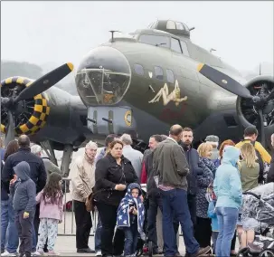  ?? Contribute­d ?? n PLANE BRILLIANT: (Clockwise from above) The B-17 Flying Fortress ‘Sally B’ on the ground before its display; younger visitors also get a chance to take to the skies; a Spitfire ML407 in action; an aerial view of the event; there was a variety of...