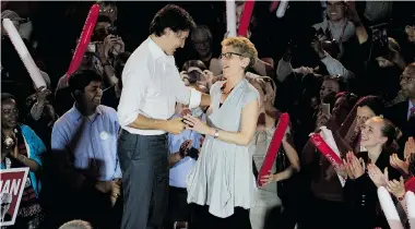  ?? NATHAN DENETTE/The Canadian Press ?? Ontario Premier Kathleen Wynne, along with federal Liberal leader Justin Trudeau, take part in a rally during a campaign stop in Toronto in May. His support of Wynne may backfire on him during his upcoming election campaign.
