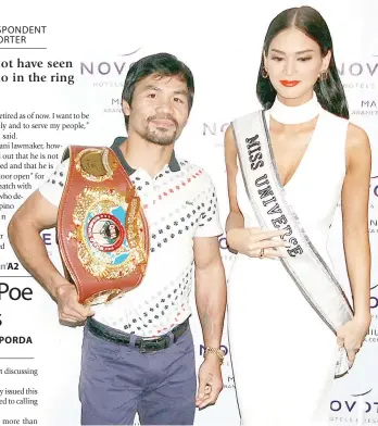  ?? PHOTO BY RUY L. MARTINEZ ?? BEAUTY AND BRAWN Miss Universe Pia Wurtzbach meets Manny Pacquiao after his welcoming parade in Quezon City.