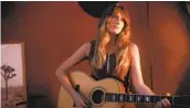  ?? COURTESY ?? Country singer Anna Vaus set up a mock bar in a Poway field to record her new single, “Girl in a Bar.”