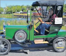  ?? ERIC MCCARTHY/JOURNAL PIONEER ?? A 1906 Model A drove off with the award for best pre-1950 antique in Saturday’s Prince County Exhibition Parade in Alberton. It was a good day for a drive and for a parade.