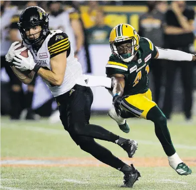  ?? GREG SOUTHAM / POSTMEDIA ?? Tiger-cats receiver Luke Tasker, pictured in June, should help with Hamilton’s recent problems in the red zone.