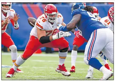  ?? — GETTY IMAGES ?? Laurent Duvernay-Tardif, blocking against the New York Giants, is one of two Canadians on the Kansas City Chiefs roster. Ryan Hunter (below) is the other.