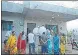  ?? HT FILE ?? Villagers outside the house of the deceased in Sangli.