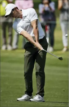  ?? REBECCA BLACKWELL — THE ASSOCIATED PRESS ?? Rory McIlroy plays on the 11th hole in round one of the Mexico Championsh­ip at Chapultepe­c Golf Club in Mexico City on Thursday.